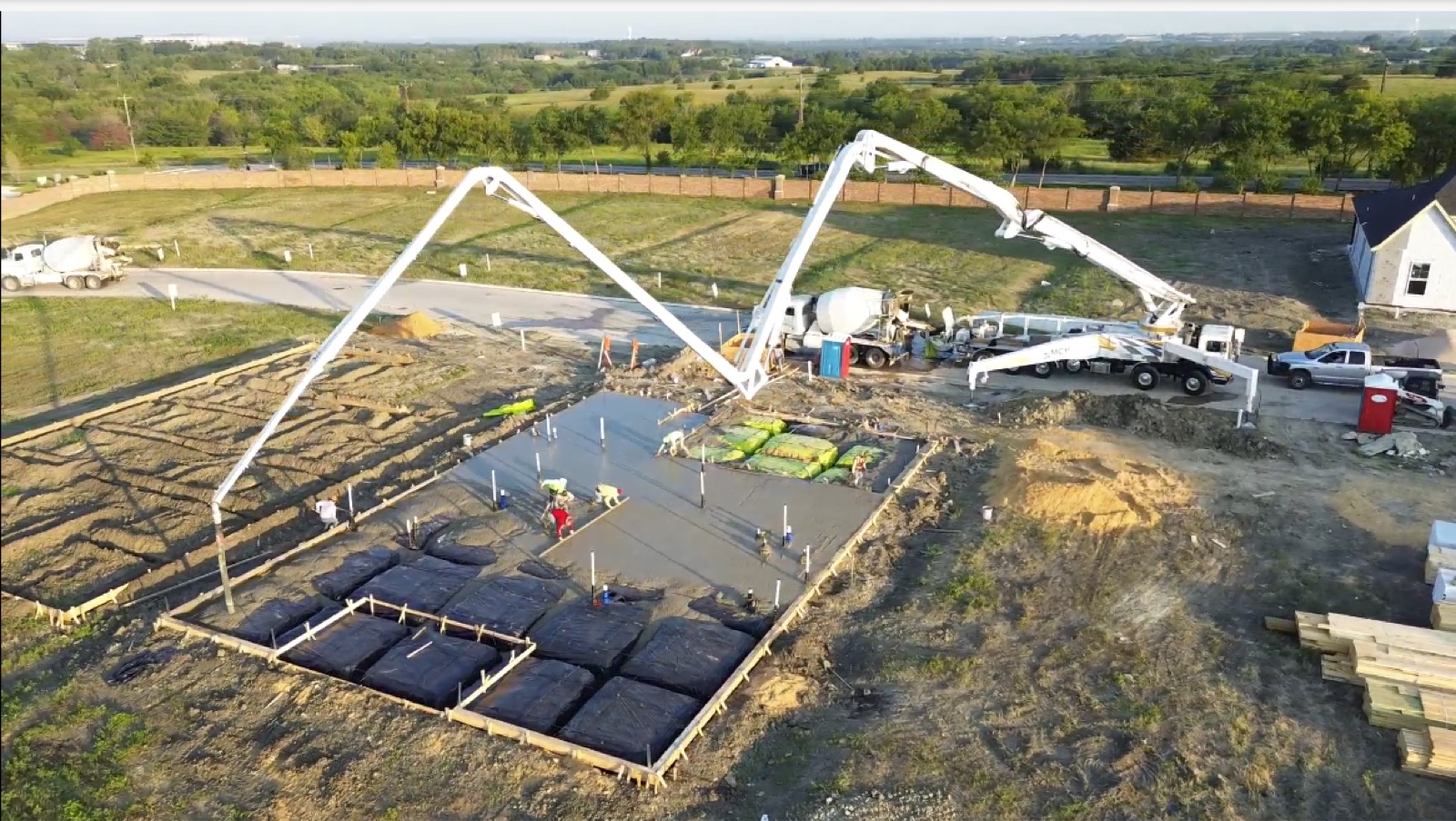 Pump trucks working on a foundation pour