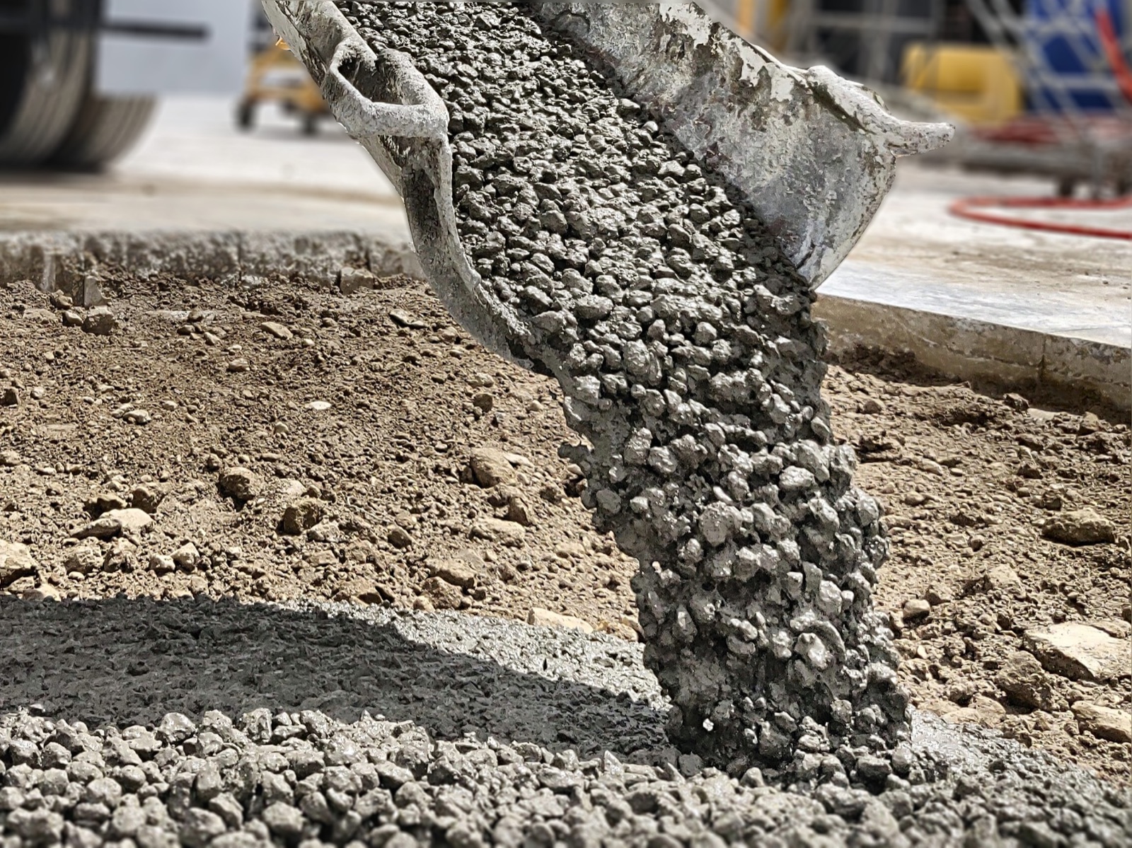Ready mix concrete pouring from a chute